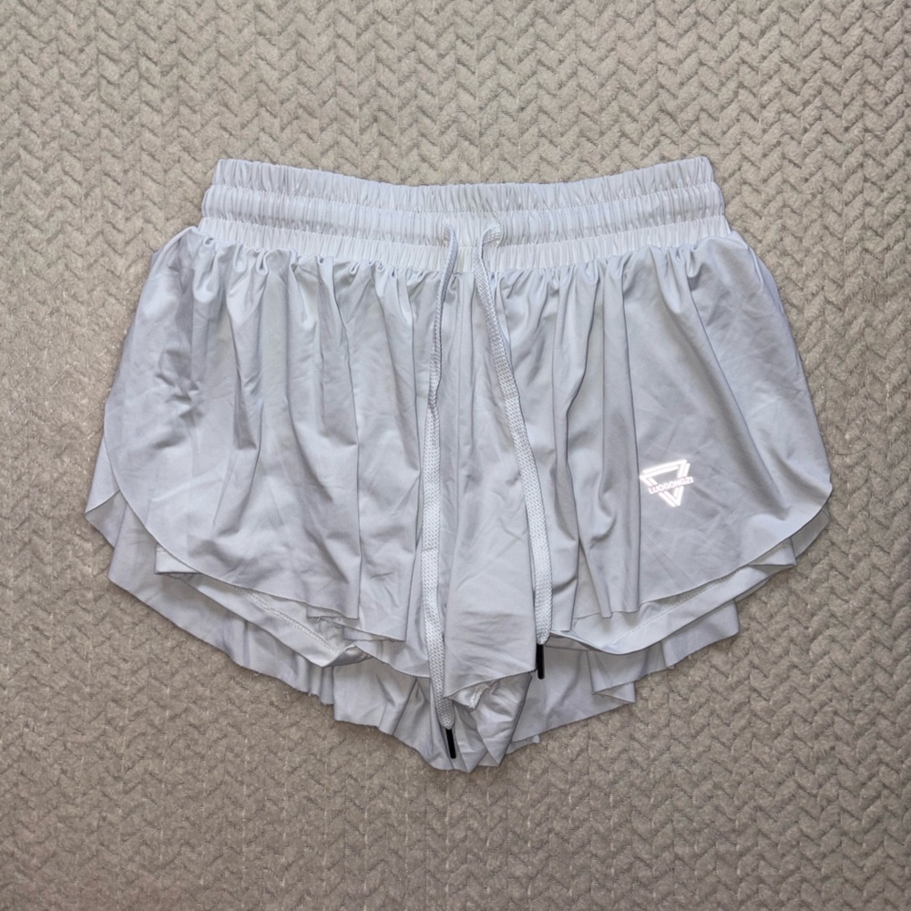 White athletic flowy shorts